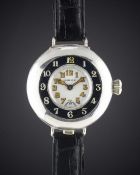 A GENTLEMAN'S SOLID SILVER ROLEX HALF HUNTER OFFICERS WRIST WATCH CIRCA 1920, WITH ENAMEL DIAL