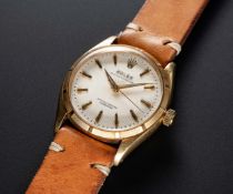 A RARE GENTLEMAN'S 18K SOLID GOLD ROLEX OYSTER PERPETUAL WRIST WATCH CIRCA 1956, REF. 6565 WITH "