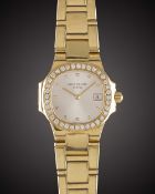 A FINE LADIES 18K SOLID YELLOW GOLD & DIAMOND PATEK PHILIPPE NAUTILUS BRACELET WATCH CIRCA 1990s,