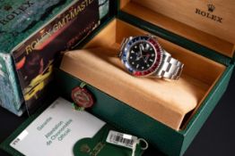 A GENTLEMAN'S STAINLESS STEEL ROLEX OYSTER PERPETUAL DATE GMT MASTER II BRACELET WATCH DATED 2004,