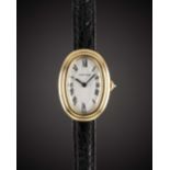 A LADIES 18K SOLID GOLD CARTIER BAIGNOIRE WRIST WATCH CIRCA 1980s Movement: Manual wind, signed