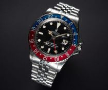 A GENTLEMAN'S STAINLESS STEEL ROLEX OYSTER PERPETUAL GMT MASTER BRACELET WATCH CIRCA 1969, REF. 1675