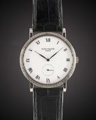 A GENTLEMAN'S 18K SOLID WHITE GOLD PATEK PHILIPPE CALATRAVA WRIST WATCH DATED 2001, REF. 3919G-001