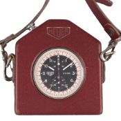 A HEUER 1/10 SECOND SPLIT SECONDS CHRONOGRAPH WATCH IN ORIGINAL FITTED LEATHER CASE WITH SHOULDER