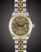 A MID SIZE STEEL, GOLD & DIAMOND ROLEX OYSTER PERPETUAL DATEJUST BRACELET WATCH CIRCA 2008, REF.