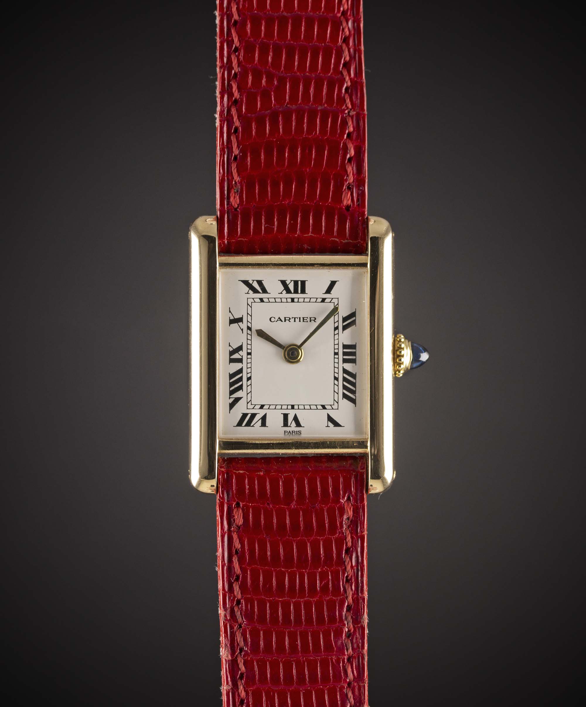 A LADIES 18K SOLID GOLD CARTIER TANK WRIST WATCH CIRCA 1980s Movement: Manual wind, signed