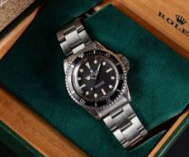 A RARE GENTLEMAN'S STAINLESS STEEL ROLEX OYSTER PERPETUAL SUBMARINER BRACELET WATCH CIRCA 1968, REF.