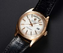 A RARE GENTLEMAN'S 18K SOLID PINK GOLD ROLEX OYSTER PERPETUAL DAY DATE WRIST WATCH CIRCA 1970,