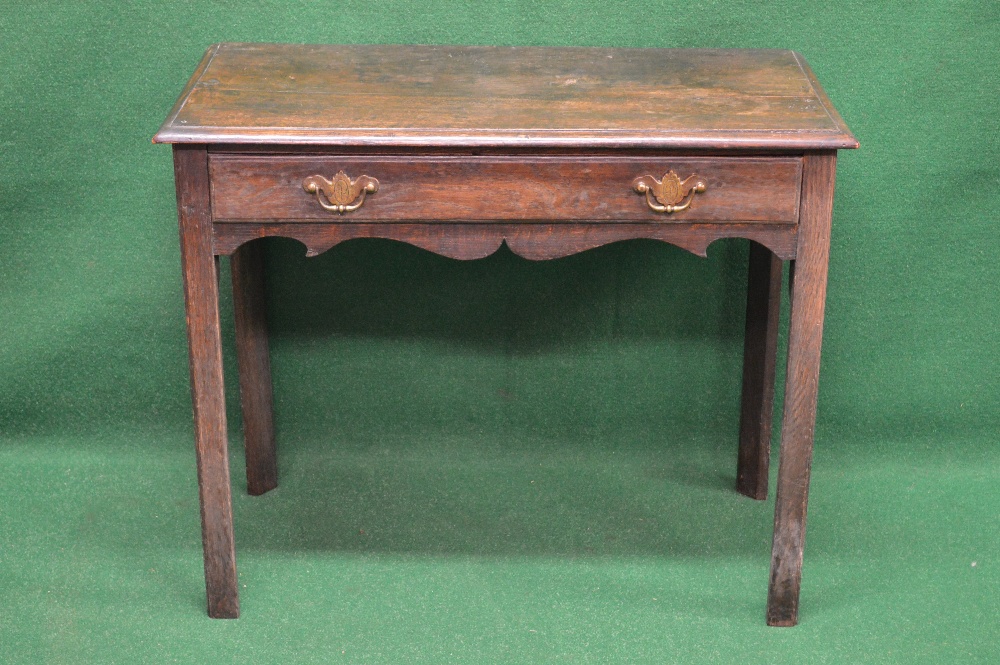 Georgian oak single drawer side table the top having moulded edge over single long drawer with