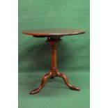 Mahogany tip top tripod table having circular top with bird cage movement,