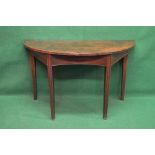 Georgian mahogany D shaped side table supported on four tapering moulded legs - 48" wide