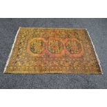 Rust ground rug with black pattern - 56" x 41.