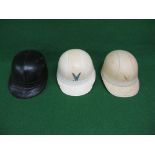 Three vintage cork motorcycle helmets two marked Everoak,