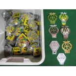 Large quantity of AA badges through the eras in brass,