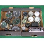 Two boxes containing: seven Smiths dashboard clocks,