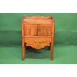 Georgian mahogany tray top commode cabinet having raised gallery with pierced carrying handles over