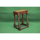 Oak joint stool having rectangular top with moulded edge supported on turned and block legs with