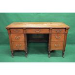 Walnut writing desk having single central drawer flanked by small drawer over two deeper drawers,