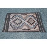 Brown ground rug having beige, brown and blue pattern - 46.5" x 29.