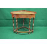 Mahogany corner table having raised gallery and bow front over single drawer with brass drop