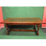 Late 20th century oak refectory dining table having cleated ends and supported on block and turned