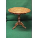Circular tip top occasional table having marquetry chess board top and carved frieze,