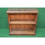 Oak carved single shelf floor standing bookcase the top and sides having carved decoration,