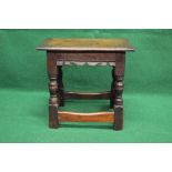 Oak joint stool having cleated ends over shaped frieze having carved inscription Watchful As