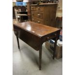 George III Mahogany Pembroke Table fitted with single drawer below and raised on round tapering