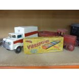 Two vintage Tinplate toy trucks and a boxed Vibraphone