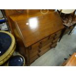 A 19th century mahogany bureau with fitted interior.