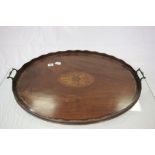 Large oval Wooden tray with two metal handles, pie crust edge and inlaid decoration to centre