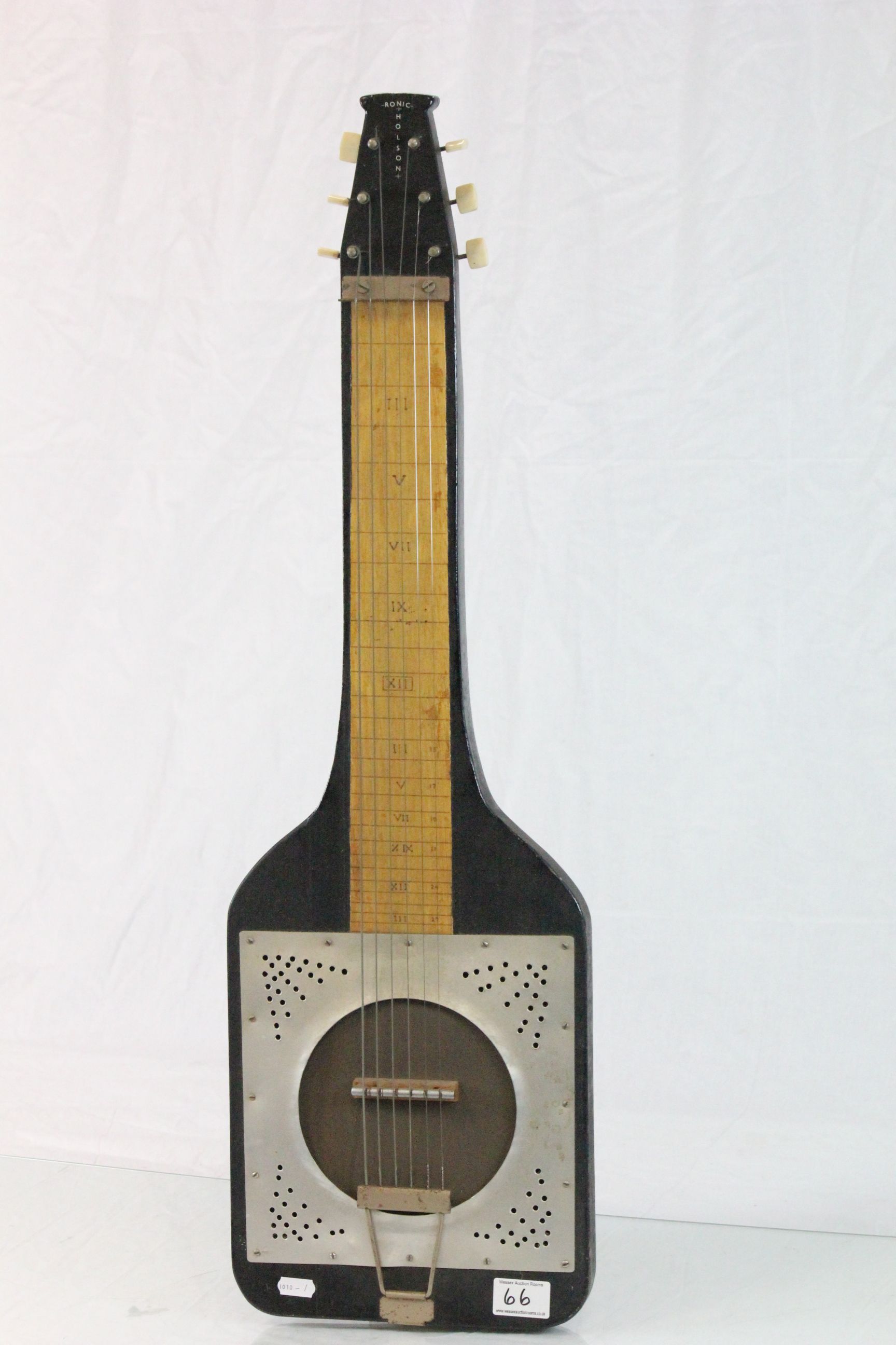 Old lap steel guitar by Ronic Holson in soft bag