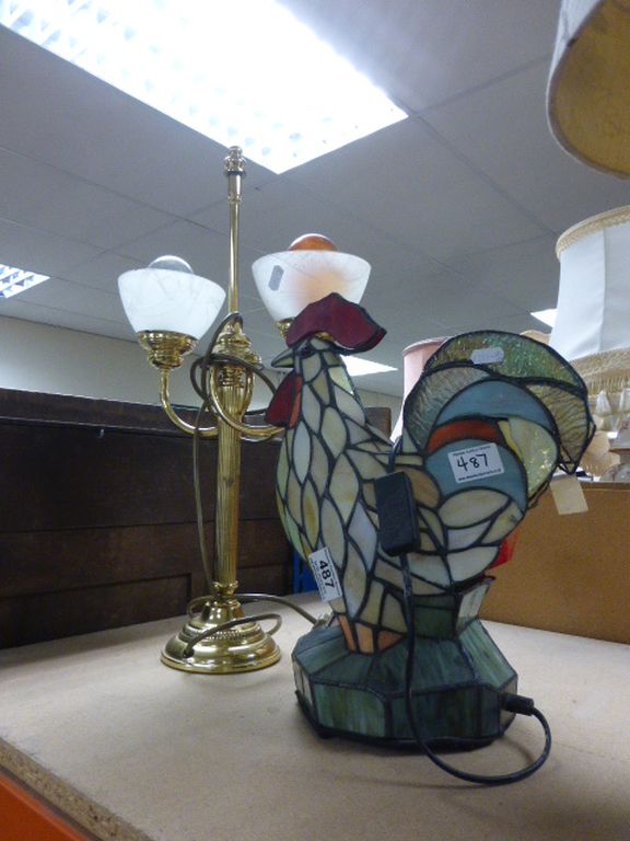 Two lamps to include one designed as a coloured glass cockerel