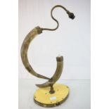 A mid 20th century cow horn lamp.