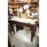 19th century mahogany console table with marble top, raised on reeded legs and bun feet.