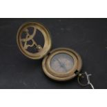 Brass cased compass and sundial