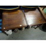 Pair of cast iron pub style tables with mahogany tops.