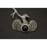 Silver marcasite swan brooch inset with onyx panel and Ruby eye