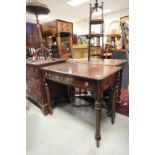 Early Victorian mahogany two drawer side table raised on turned supports.