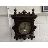 Wooden cased wall clock with key