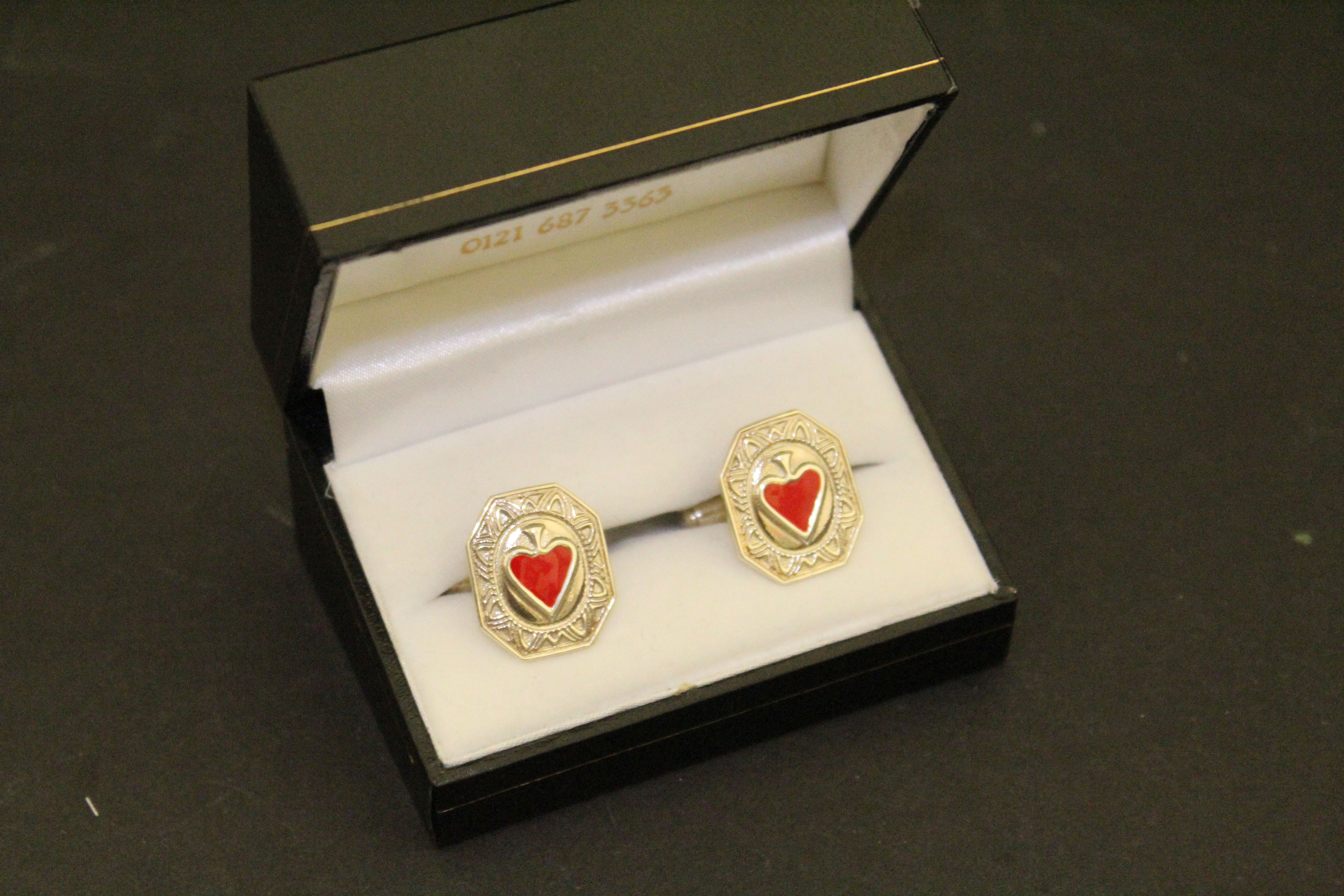 Pair of Silver and enamel set of heart shaped cufflinks