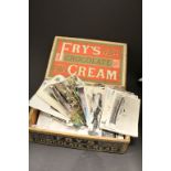 Collection of vintage Postcards in an old wooden Fry's Chocolate Cream box