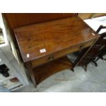 AN early 20th century mahogany string inlaid two tier side table with single drawer.