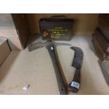 A military trench axe, ammo box and vintage axe