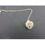 Silver heart shaped necklace on Silver chain