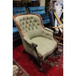 Victorian Mahogany Framed Buttonback Armchair with carved scroll arms and legs