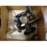 Boxed miniature Singer sewing machine model 20