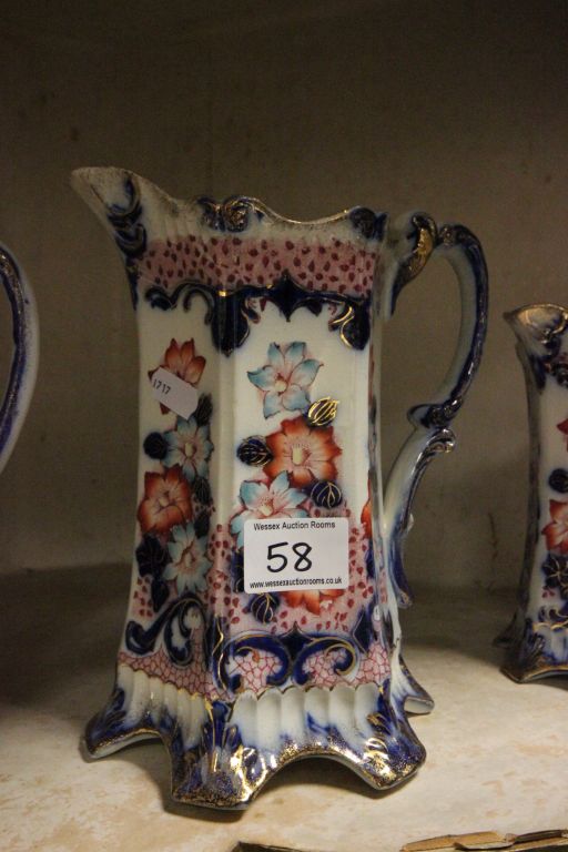 Set of three graduating 19th century Ironstone jugs - Image 2 of 2