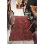 Small Eastern Red Ground Wool Rug with Geometric Patterns